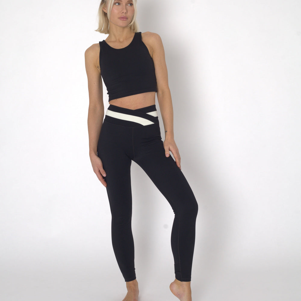 
                  
                    YOGAFLOW BACK WRAP CROPPED TOP DUO BLACK
                  
                