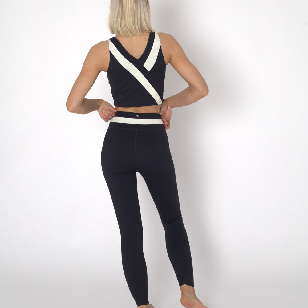 
                  
                    YOGAFLOW BACK WRAP CROPPED TOP DUO BLACK
                  
                