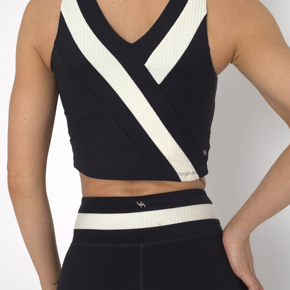 
                  
                    YOGAFLOW BACK WRAP CROPPED TOP DUO BLACK
                  
                